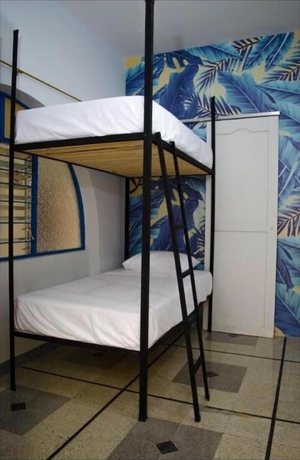 Imagen de la habitación del Hotel Hostal Pura Vida La 70. Foto 14