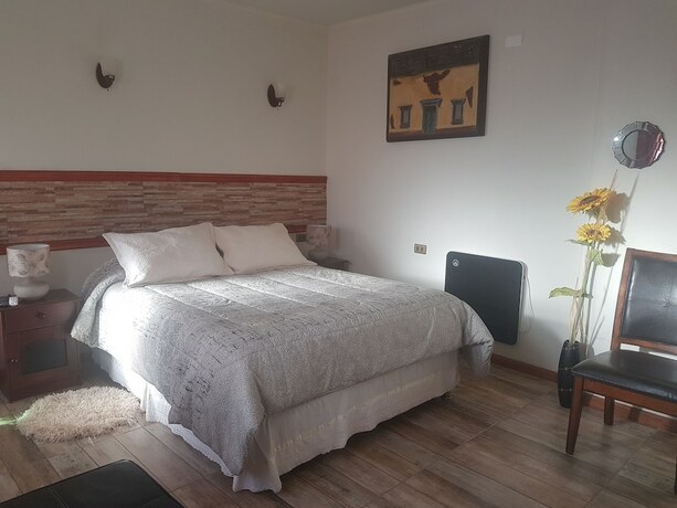 Imagen de la habitación del Hotel Hostal Puritama. Foto 11