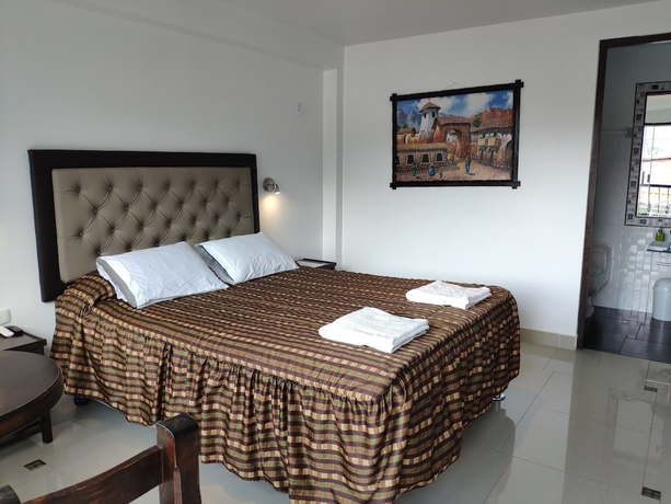 Imagen de la habitación del Hotel Hostal Quilla. Foto 4