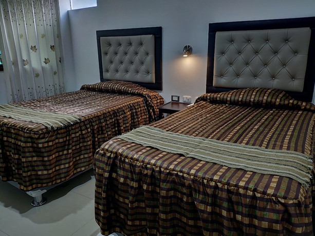 Imagen de la habitación del Hotel Hostal Quilla. Foto 8