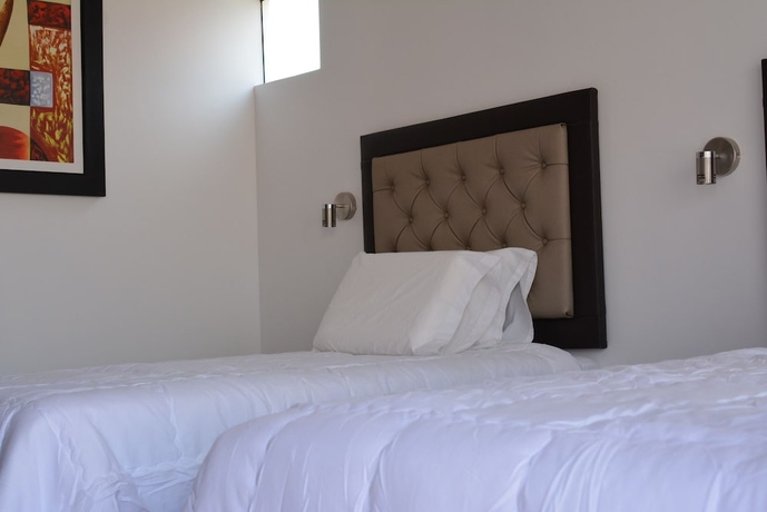 Imagen de la habitación del Hotel Hostal Quilla. Foto 9