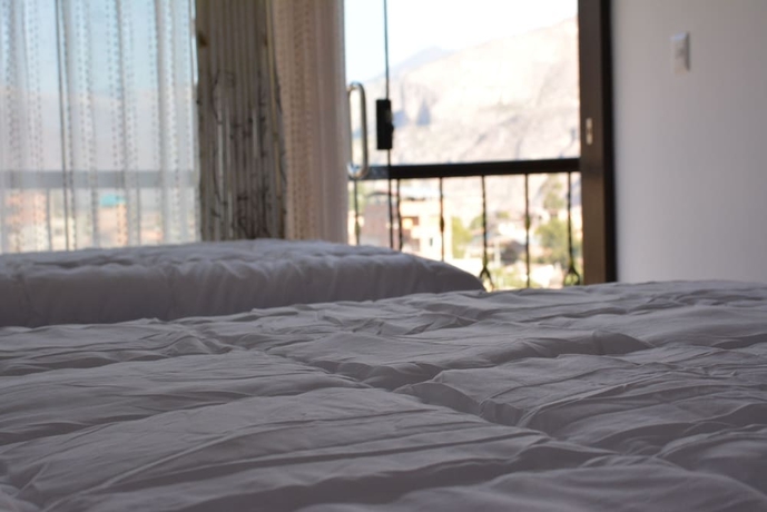 Imagen de la habitación del Hotel Hostal Quilla. Foto 10