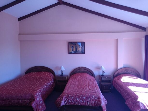 Imagen de la habitación del Hotel Hostal Real Los Andes del Lago. Foto 18