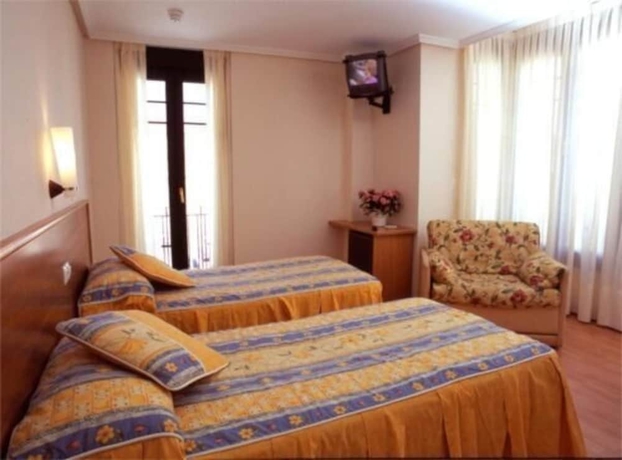 Imagen de la habitación del Hotel Hostal Restaurante Boccalino. Foto 13