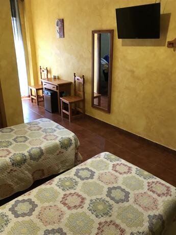 Imagen de la habitación del Hotel Hostal Restaurante El Mero. Foto 16