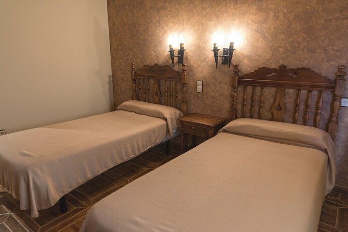 Imagen de la habitación del Hotel Hostal Restaurante La Sima. Foto 18