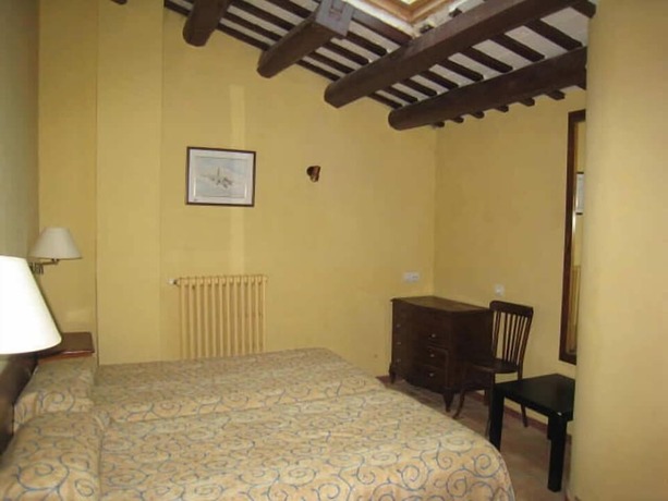 Imagen de la habitación del Hotel Hostal Rural Can Enric. Foto 17