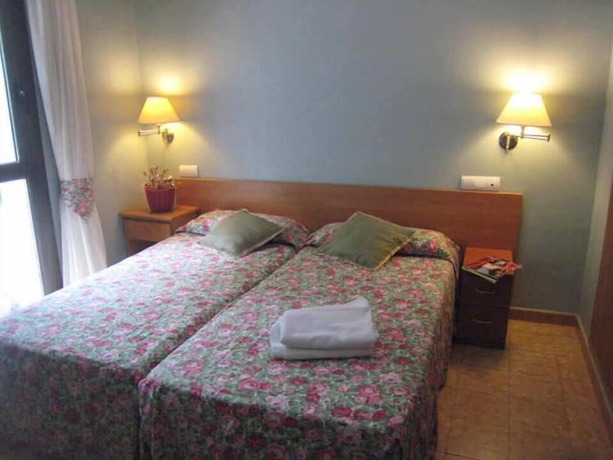Imagen de la habitación del Hotel Hostal Rural Can Enric. Foto 18
