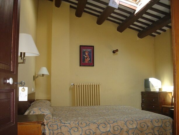 Imagen de la habitación del Hotel Hostal Rural Can Enric. Foto 19