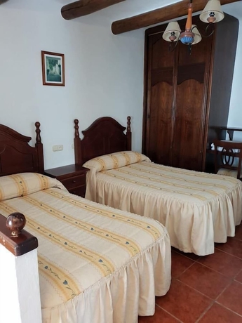 Imagen de la habitación del Hotel Hostal Rural Ruta de las Nieves. Foto 4