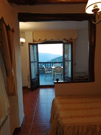 Imagen de la habitación del Hotel Hostal Rural Ruta de las Nieves. Foto 6