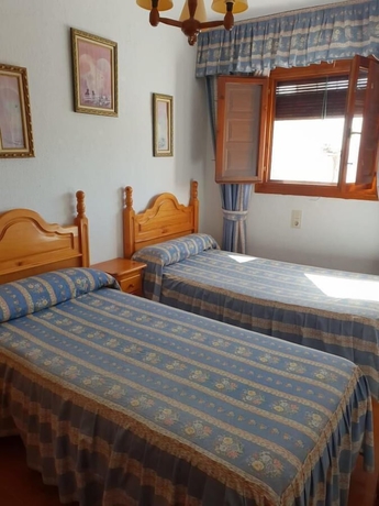 Imagen de la habitación del Hotel Hostal Rural Ruta de las Nieves. Foto 7