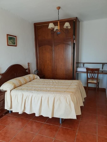 Imagen de la habitación del Hotel Hostal Rural Ruta de las Nieves. Foto 8