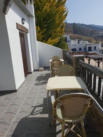 Imagen de la habitación del Hotel Hostal Rural Ruta de las Nieves. Foto 9