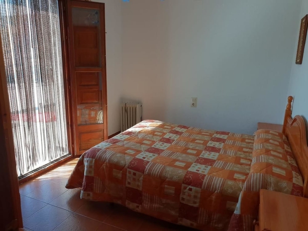 Imagen de la habitación del Hotel Hostal Rural Ruta de las Nieves. Foto 12