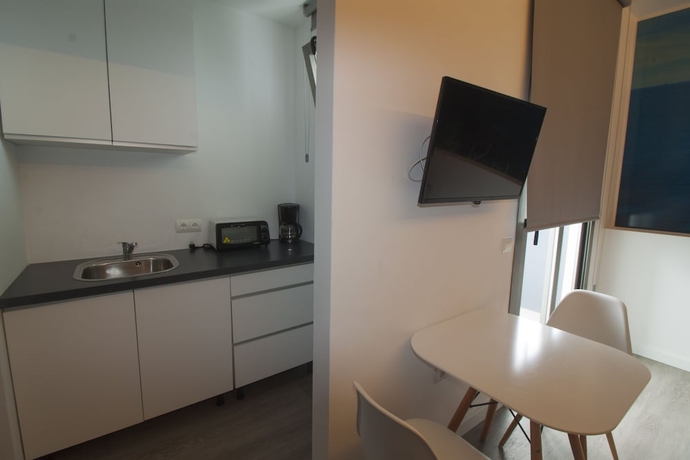 Imagen de la habitación del Hotel Hostal Sa Vinya Suites. Foto 9