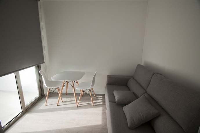 Imagen de la habitación del Hotel Hostal Sa Vinya Suites. Foto 11