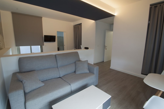 Imagen de la habitación del Hotel Hostal Sa Vinya Suites. Foto 13
