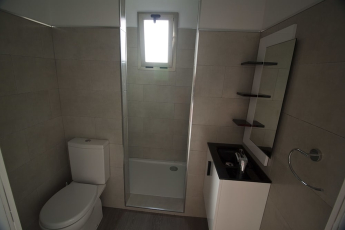 Imagen de la habitación del Hotel Hostal Sa Vinya Suites. Foto 14