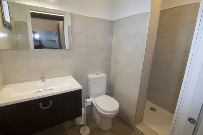 Imagen de la habitación del Hotel Hostal Sa Vinya Suites. Foto 16