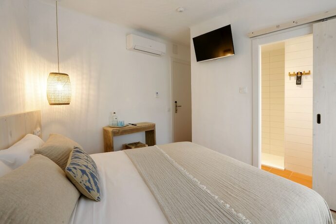 Imagen de la habitación del Hotel Hostal Ses Negres. Foto 17