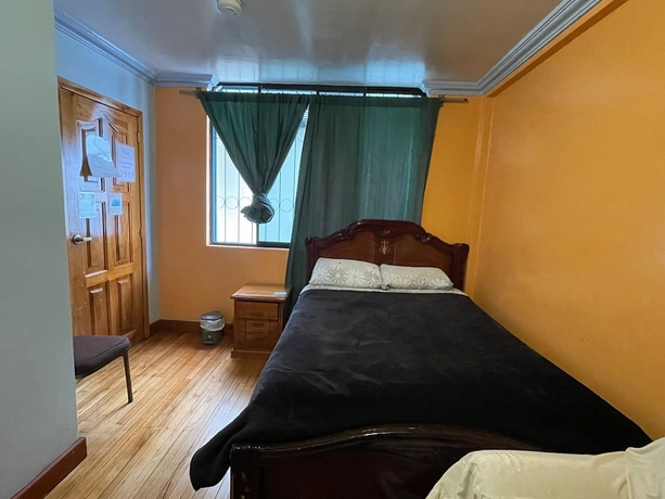 Imagen de la habitación del Hotel Hostal Taxo Yura. Foto 3