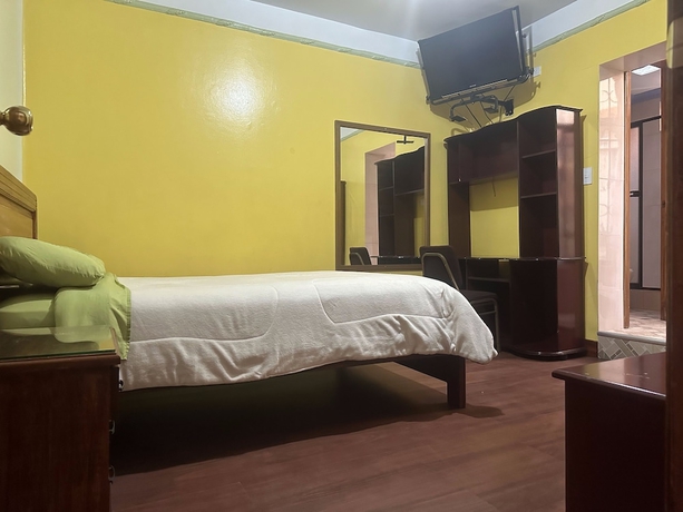 Imagen de la habitación del Hotel Hostal Taxo Yura. Foto 4