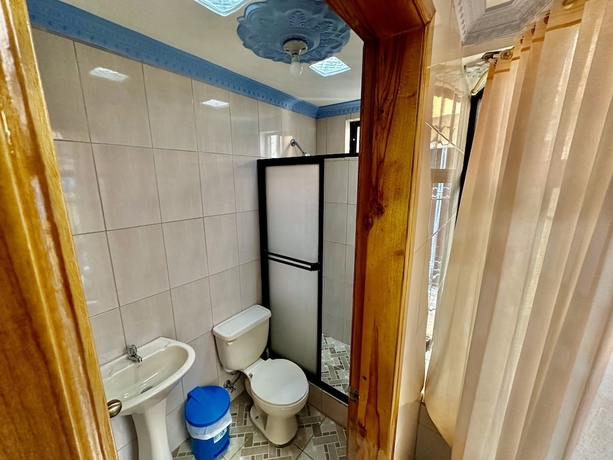 Imagen de la habitación del Hotel Hostal Taxo Yura. Foto 11