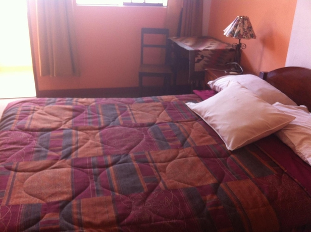 Imagen de la habitación del Hotel Hostal Tres Mascaras. Foto 14
