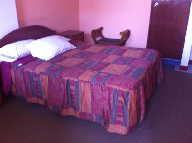 Imagen de la habitación del Hotel Hostal Tres Mascaras. Foto 16