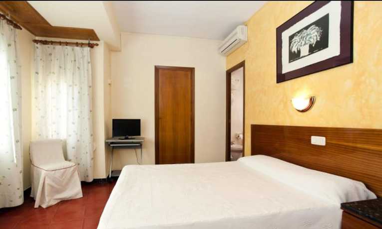 Imagen de la habitación del Hotel Hostal Tropical. Foto 7