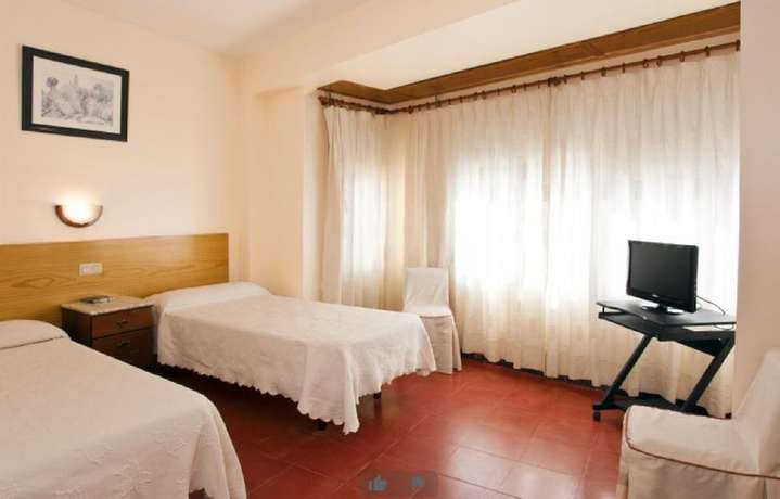 Imagen de la habitación del Hotel Hostal Tropical. Foto 10