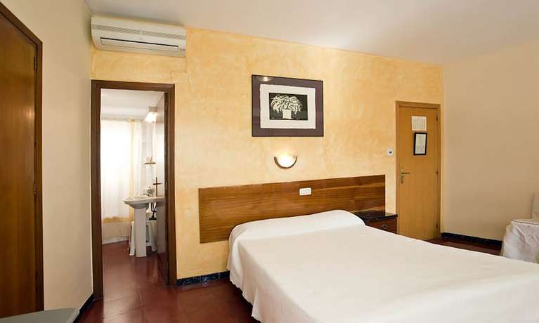 Imagen de la habitación del Hotel Hostal Tropical. Foto 11