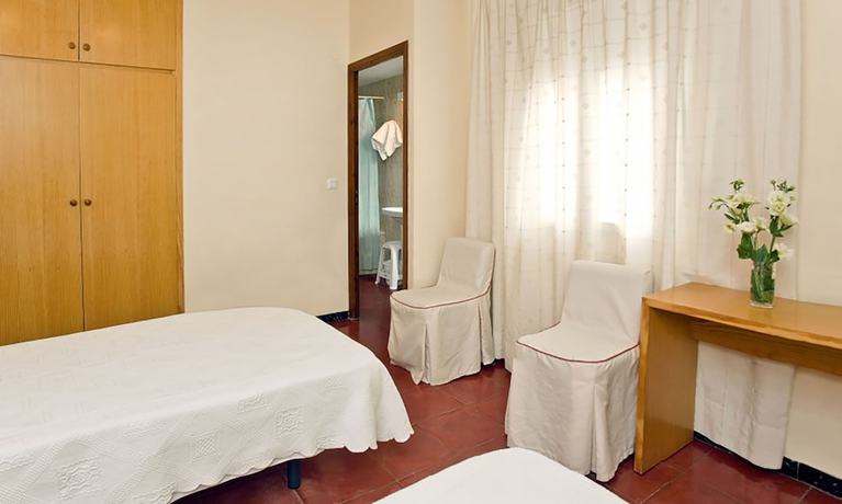 Imagen de la habitación del Hotel Hostal Tropical. Foto 12