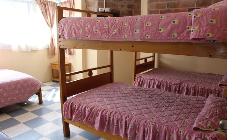 Imagen de la habitación del Hotel Hostal Tungurahua. Foto 14