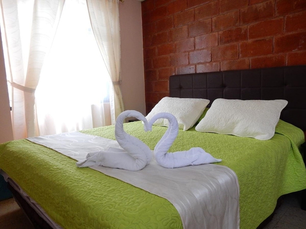 Imagen de la habitación del Hotel Hostal Tungurahua. Foto 16