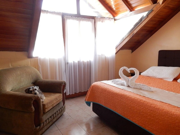 Imagen de la habitación del Hotel Hostal Tungurahua. Foto 17