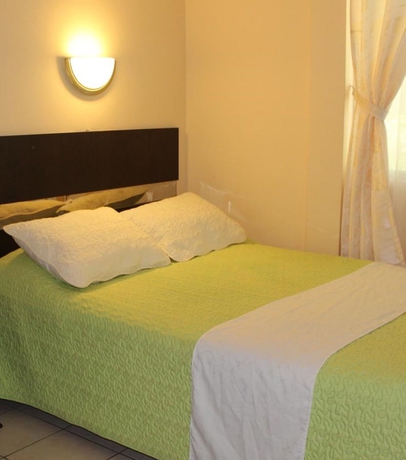 Imagen de la habitación del Hotel Hostal Tungurahua. Foto 18