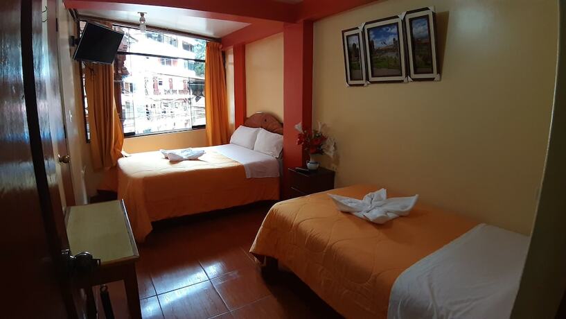Imagen de la habitación del Hotel Hostal Urpi. Foto 11