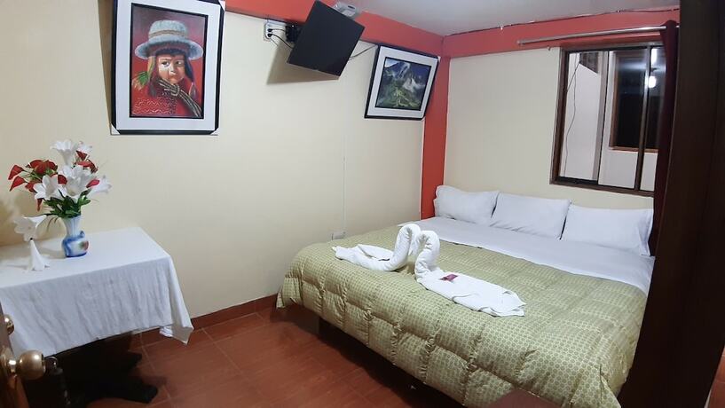 Imagen de la habitación del Hotel Hostal Urpi. Foto 16