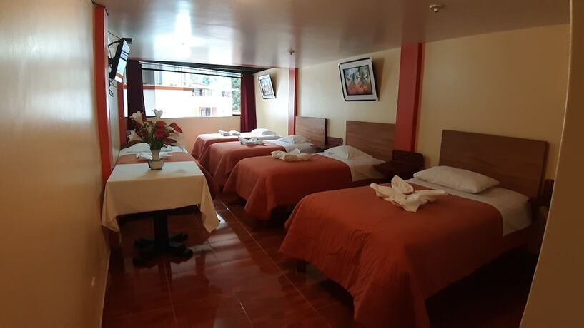 Imagen de la habitación del Hotel Hostal Urpi. Foto 17