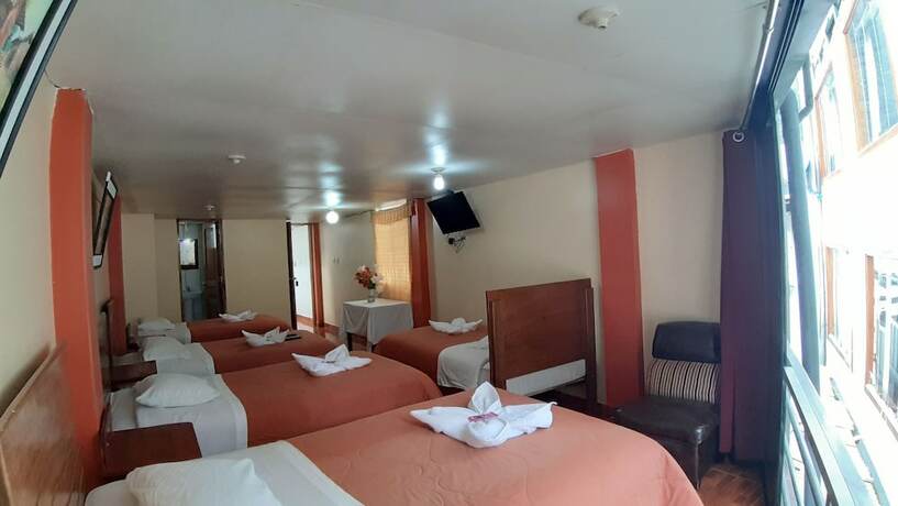 Imagen de la habitación del Hotel Hostal Urpi. Foto 18
