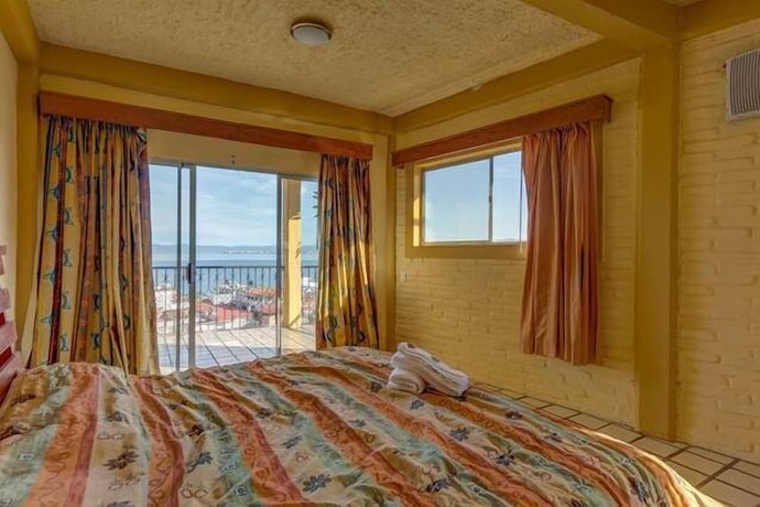 Imagen de la habitación del Hotel Hostal Vallarta Suites. Foto 14