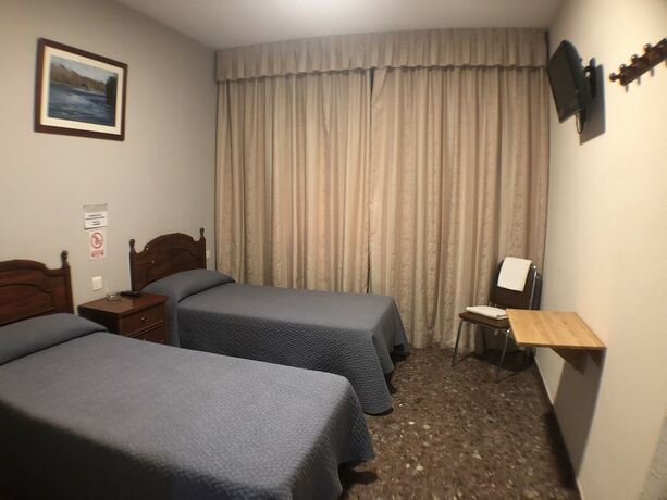 Imagen de la habitación del Hotel Hostal Venecia. Foto 15