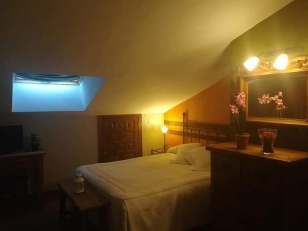 Imagen de la habitación del Hotel Hostal la Cerca. Foto 20