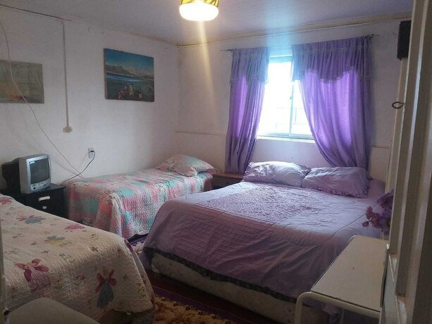 Imagen de la habitación del Hotel Hostal playa las conchitas. Foto 5