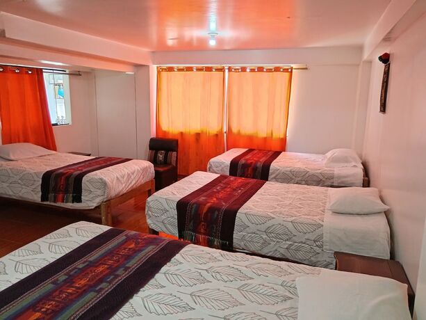 Imagen de la habitación del Hotel Hostal sinchiroca machupicchu. Foto 11