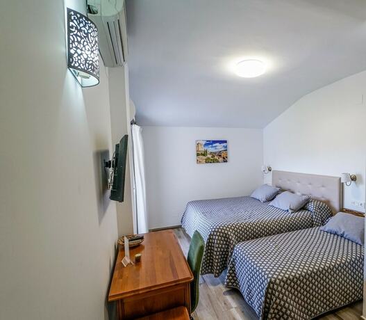 Imagen de la habitación del Hotel Hostal y Apartamento Rural Los Naranjos. Foto 15