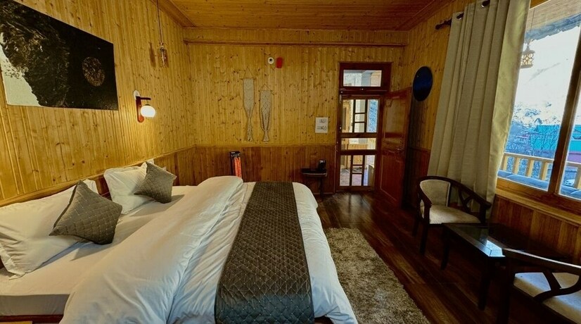 Imagen de la habitación del Hotel Hostay Tirthan. Foto 19