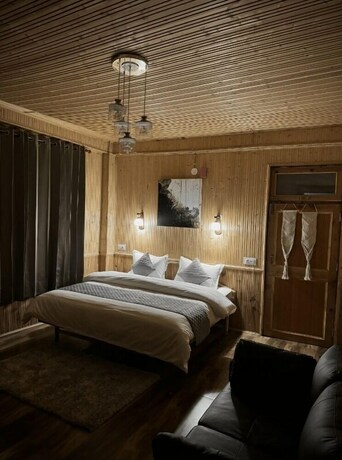 Imagen de la habitación del Hotel Hostay Tirthan. Foto 20